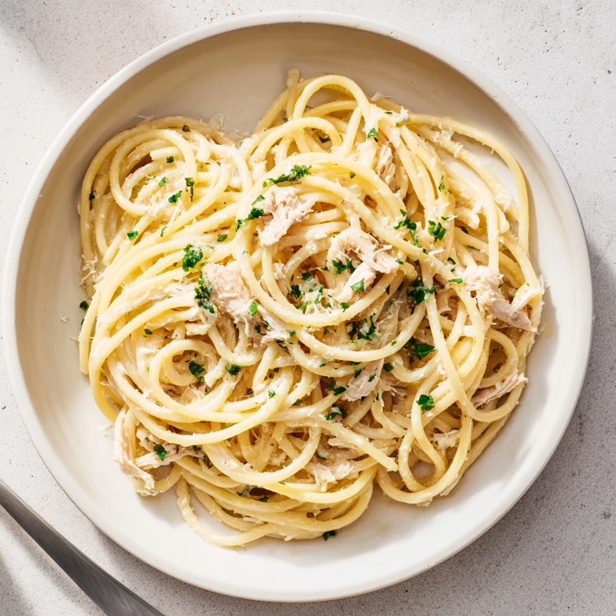 Imagine the steaming Simple Garlic Butter Bucatini, with Parmesan and parsley, a quick Italian-inspired comfort dish.