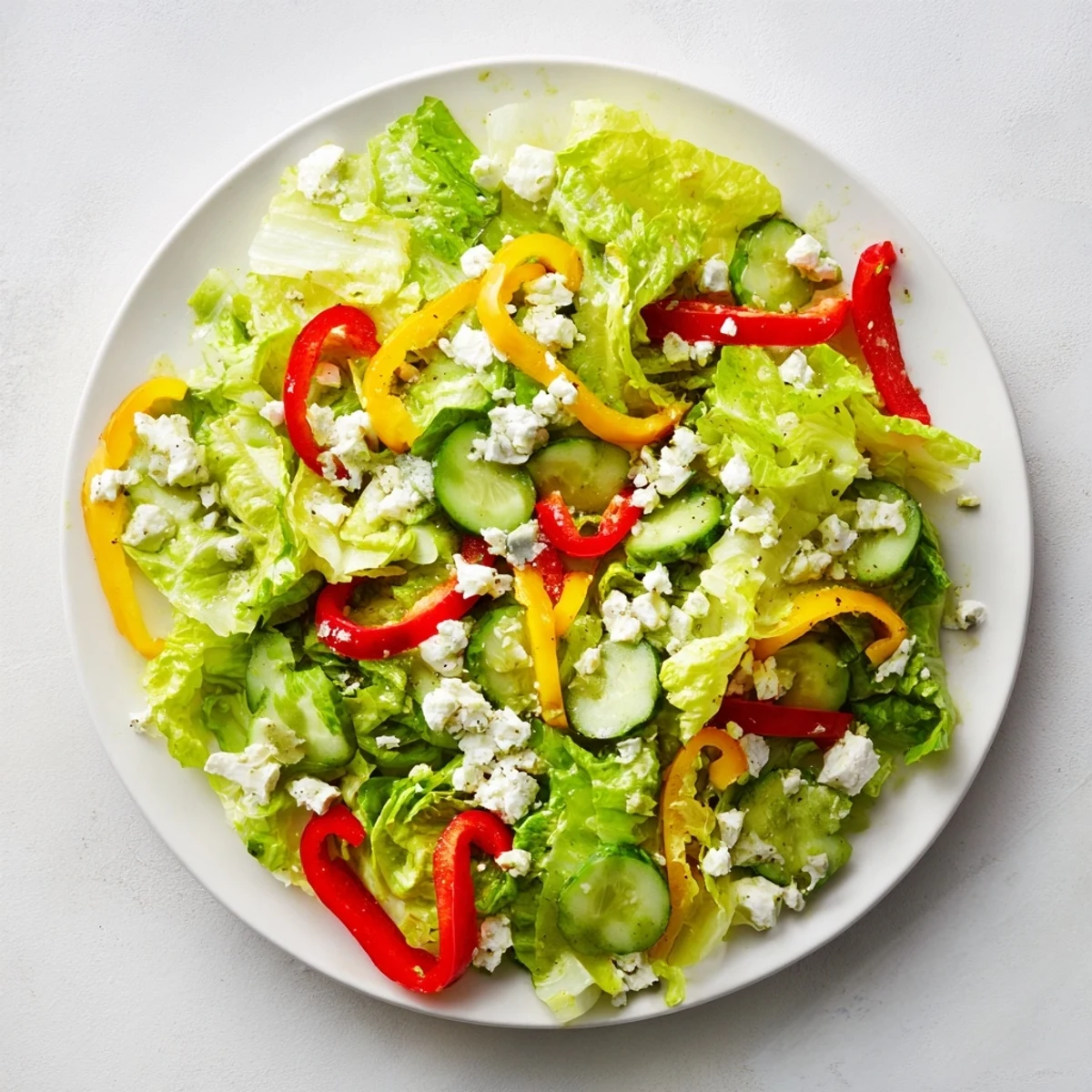 Fresh Bella Hadid Salad: Bright, Mediterranean-inspired salad with crisp vegetables, feta, and a light lemon dressing.