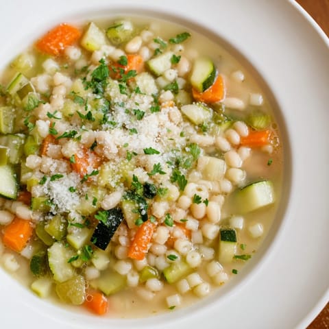 Close-up of a vibrant Simple One-Pot Minestrone Soup; a delicious, vegetarian Italian classic.
