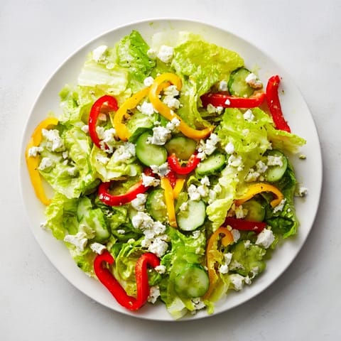 Fresh Bella Hadid Salad: Bright, Mediterranean-inspired salad with crisp vegetables, feta, and a light lemon dressing.