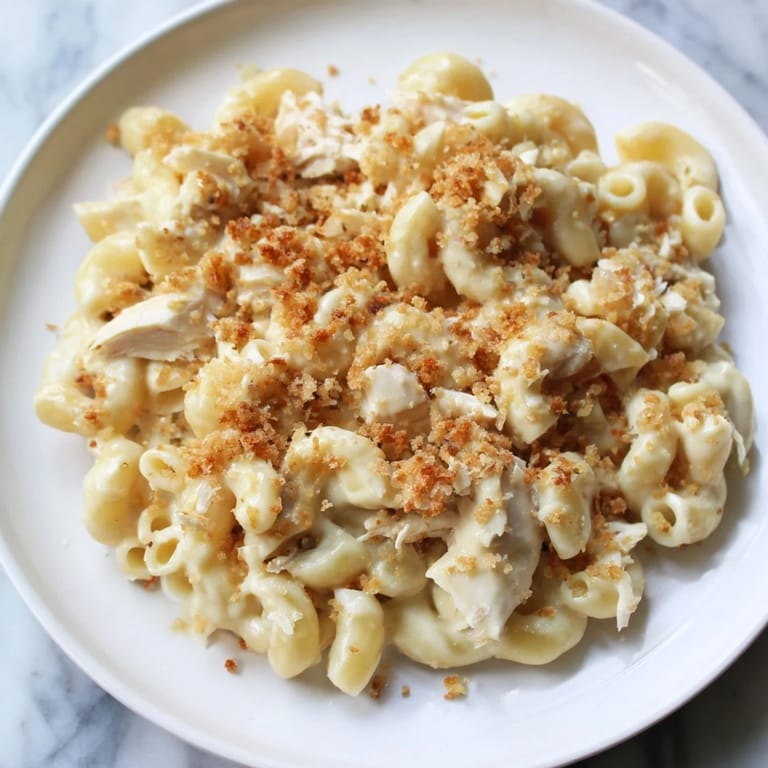 Golden, bubbly baked Struggle Meal Chicken Macaroni, a comforting American classic for an easy meal.