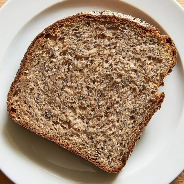 Imagine warm Latvian Rupjmaize bread, the dense, dark rye inside, perfect alongside creamy butter or soup.